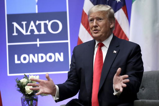 FILE - President Donald Trump speaks during the NATO summit