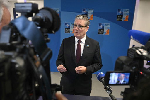 Britain's Prime Minister Keir Starmer speaks to the media as he arrives for the NATO summit of heads of state and government in The Hague Wednesday