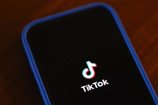 FILE - The TikTok app logo is shown on an iPhone on Friday