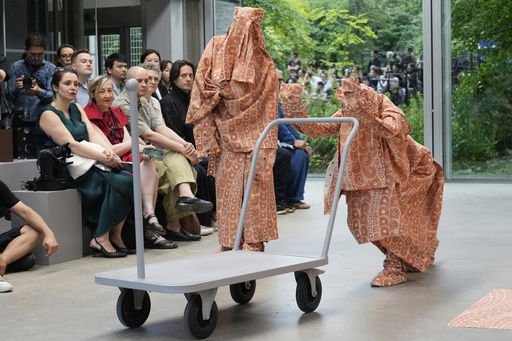 A model wears a creation part of the Issey Miyake men's Spring-Summer 2026 collection
