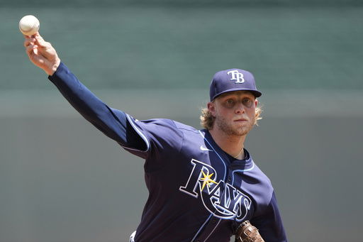 Tampa Bay Rays starting pitcher Shane Baz throws during the first inning of a baseball game against the Kansas City Royals