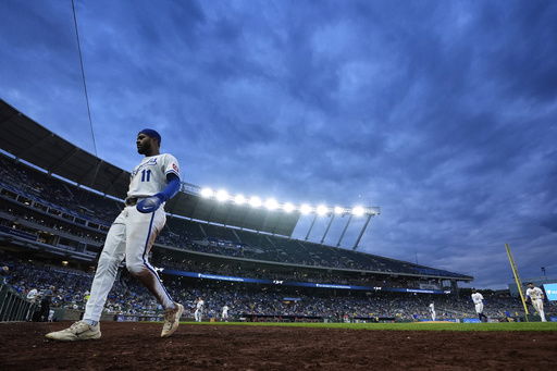 Kansas City Royals third baseman Maikel Garcia comes off the field during the sixth inning of a baseball game against the Cincinnati Reds