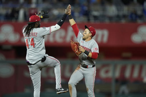 Cincinnati Reds' Elly De La Cruz (44) and TJ Friedl