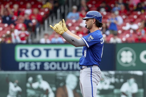 Kansas City Royals' Jac Caglianone gestures toward the dugout after hiding an RBI double during the fourth inning against the St. Louis Cardinals in the first baseball game of a doubleheader