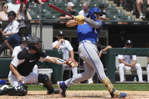 Kansas City Royals' Jac Caglianone hits a single during the second inning of a baseball game against the Chicago White Sox in Chicago