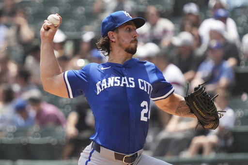 Kansas City Royals starting pitcher Michael Lorenzen throws against the Chicago White Sox during the first inning of a baseball game in Chicago