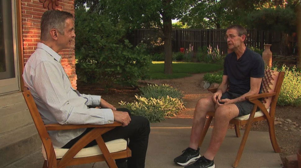 <i>KCNC via CNN Newsource</i><br/>CBS Colorado's Alan Gionet interviews Greg Johnson.