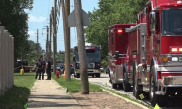 Police investigate a shooting outside CrossPointe Community Church in Wayne