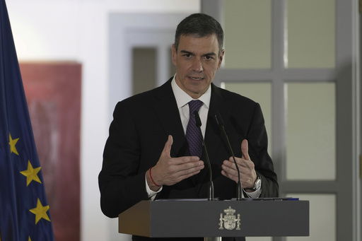 FILE - Spain's Prime Minister Pedro Sanchez speaks during a press conference at the Spanish Embassy in Beijing