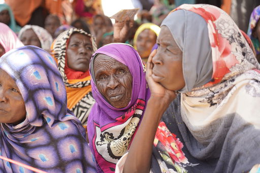This September 2022 photo provided by the World Food Program shows internally displaced people at the ZamZam camp in El Fasher