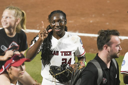 Texas Tech pitcher NiJaree Canady celebrates during the second game of the NCAA softball Women's College World Series finals against Texas in Oklahoma City