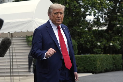 President Donald Trump walks to board Marine One after speakiing with reporters to depart the White House on his way to attend the G7 Summit in Canada