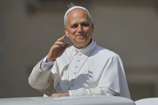 Pope Leo XIV arrives for his weekly general audience in St. Peter's Square at the Vatican