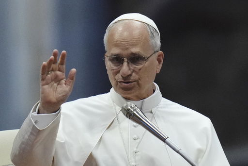 Pope Leo XIV waves during a meditation with the participants into the Jubilee of Seminarists in St. Peter's Basilica at the Vatican