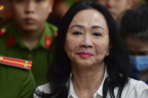 FILE -Business woman Truong My Lan attends a trial in Ho Chi Minh City