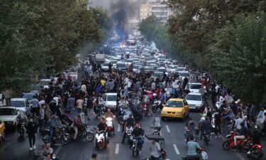 Demonstrators take part in anti-Israel and anti-US demonstrations in Tehran