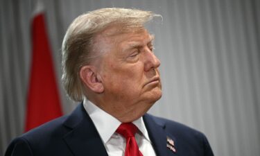 President Donald Trump looks on as Canadian Prime Minister Mark Carney speaks as they meet during the Group of Seven Summit at the Pomeroy Kananaskis Mountain Lodge in Kananaskis