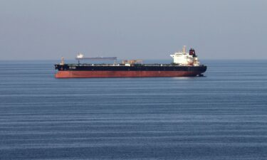 Oil tankers pass through the Strait of Hormuz on December 21