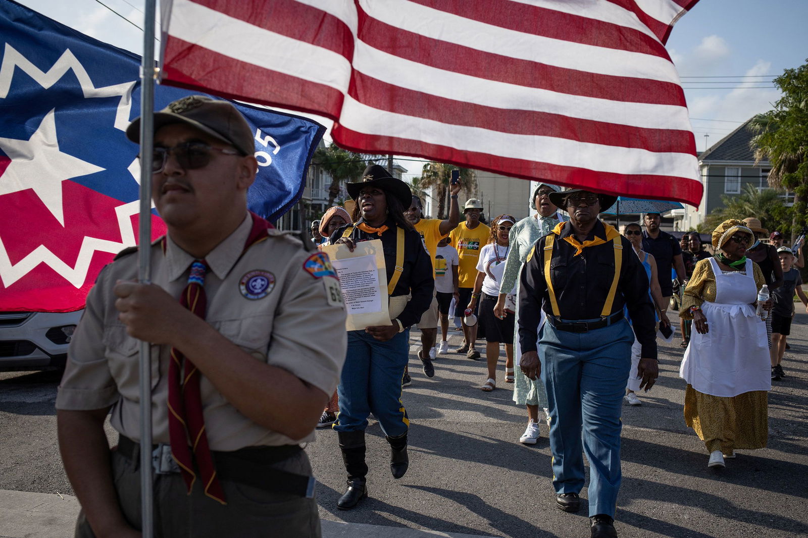 <i>Adrees Latif/Reuters via CNN Newsource</i><br/>A march reenactment celebrates Juneteenth in Galveston