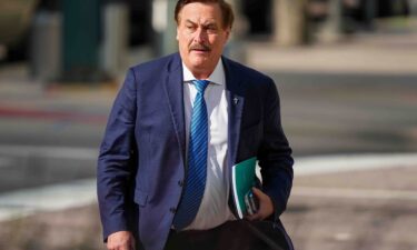 Mike Lindell walks into federal district court for a defamation trial on June 5 in Denver. (AP Photo/Jack Dempsey)
