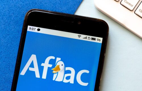 In this photo illustration an Aflac logo is seen displayed on a smartphone.