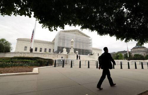 A person walks past the U.S. Supreme Court in Washington