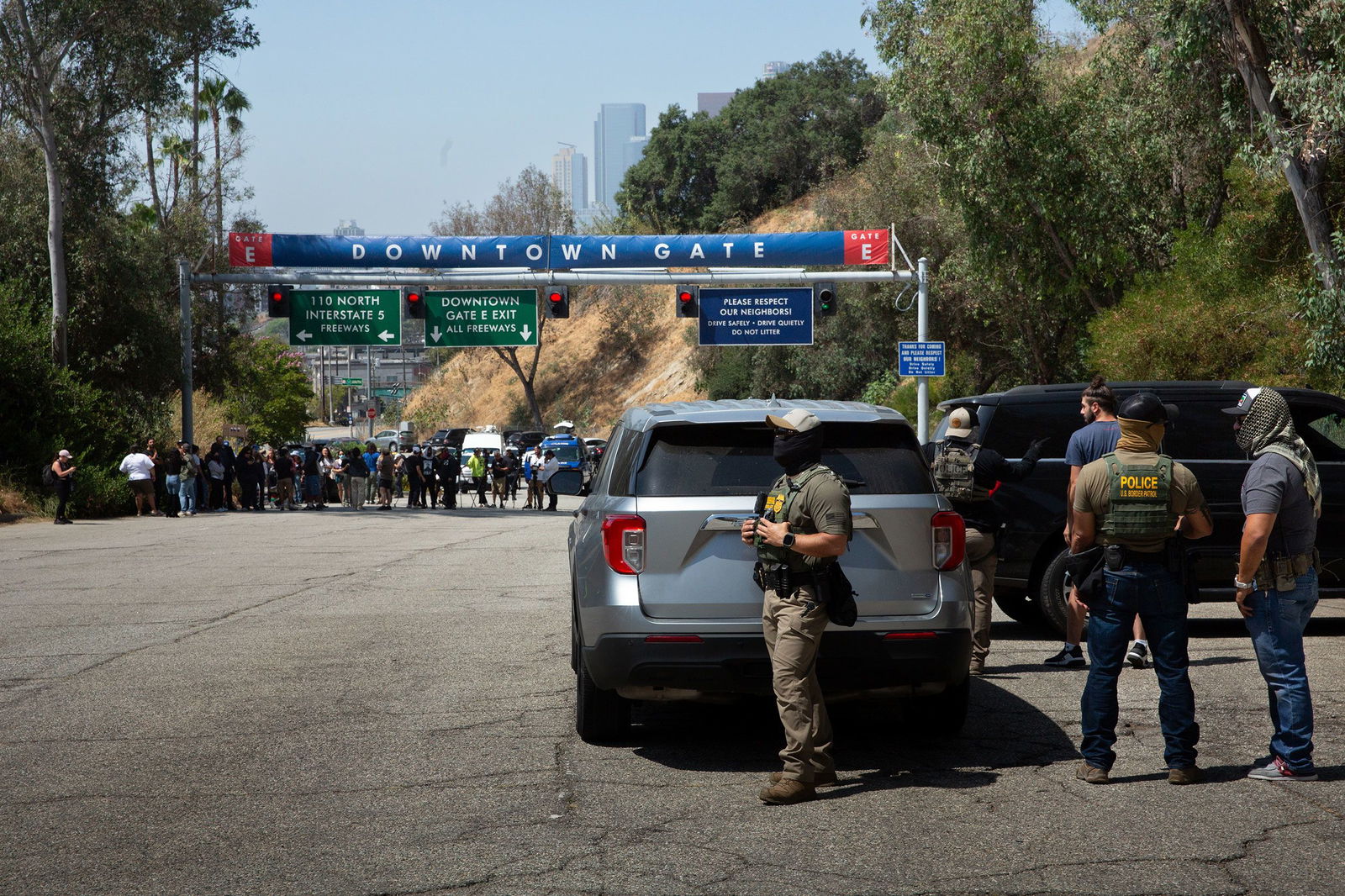 <i>Zin Chiang/picture alliance/Getty Images via CNN Newsource</i><br/>Border Patrol agents stand at Gate E of Dodger Stadium in Los Angeles.