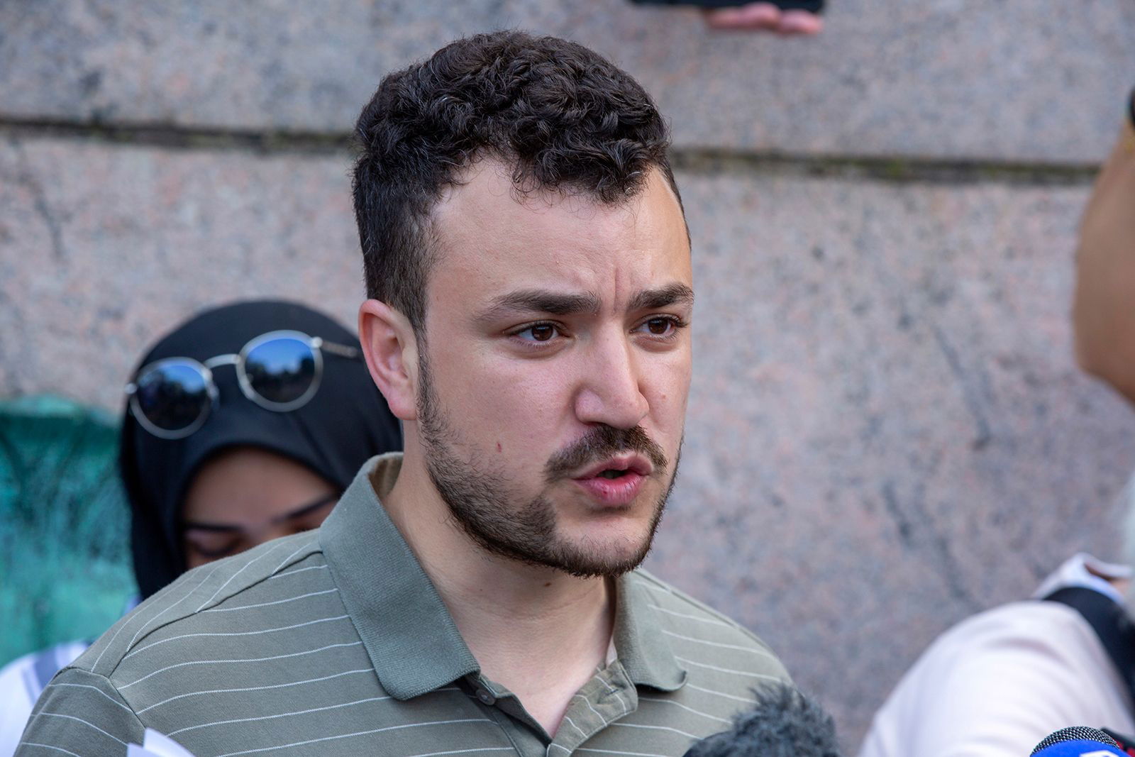 <i>Ted Shaffrey/AP via CNN Newsource</i><br/>Mahmoud Khalil attends a pro-Palestinian protest encampment on the Columbia University campus in New York in April 2024.