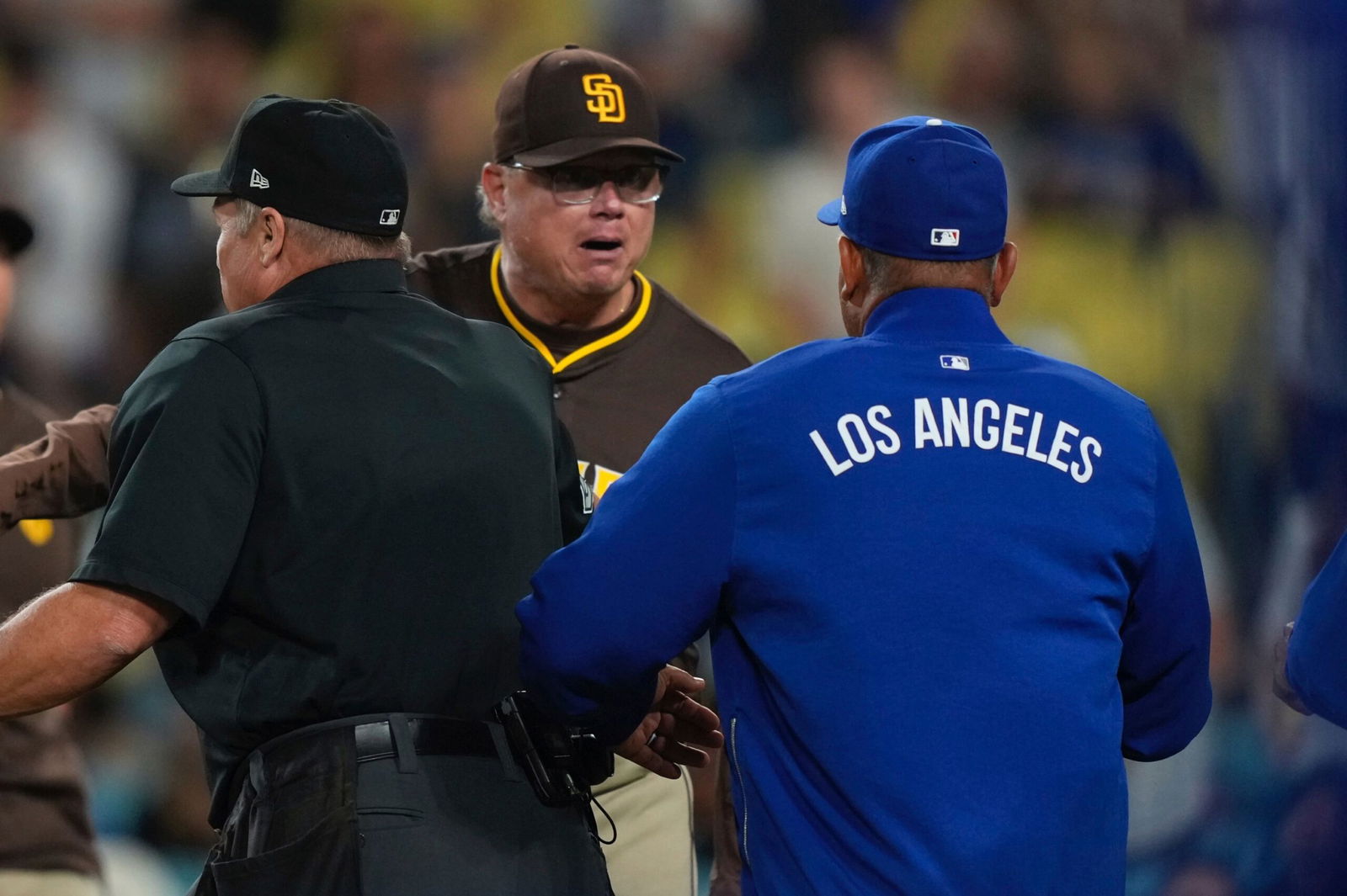 <i>Mark J. Terrill/AP via CNN Newsource</i><br/>Dodgers superstar Shohei Ohtani waves off teammates after getting hit by a pitch in the ninth inning on June 19.