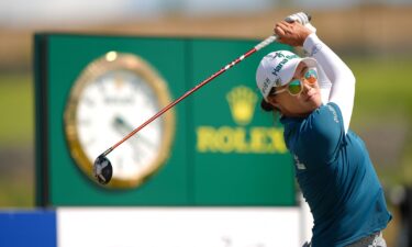Lee battled strong winds and high temperatures to win her third career major.