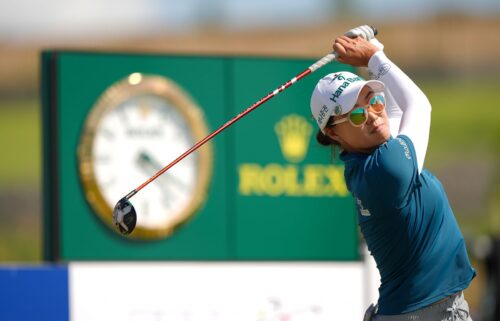 Lee battled strong winds and high temperatures to win her third career major.