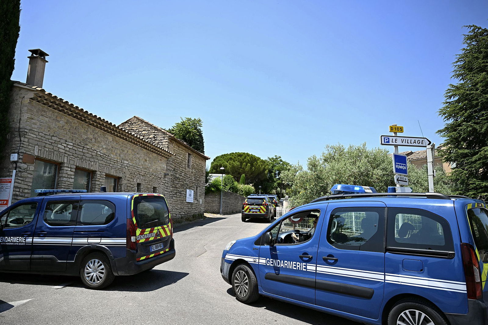 <i>Gabriel Bouys/AFP/Getty Images via CNN Newsource</i><br/>French law enforcement vehicles form a perimeter around the site of the shooting in the village of Goult.