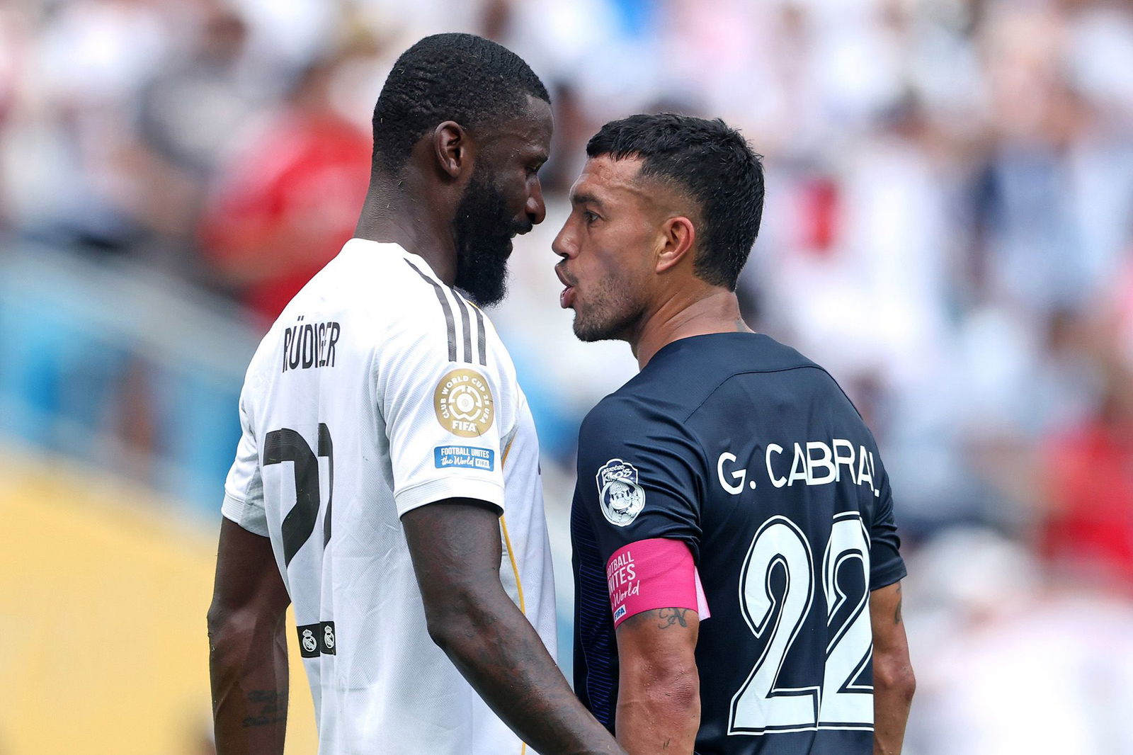 <i>Richard Pelham/Getty Images via CNN Newsource</i><br/>Antonio Rüdiger (left) and Gustavo Cabral (right) clash during the Real Madrid vs. Pachuca game at the FIFA Club World Cup.