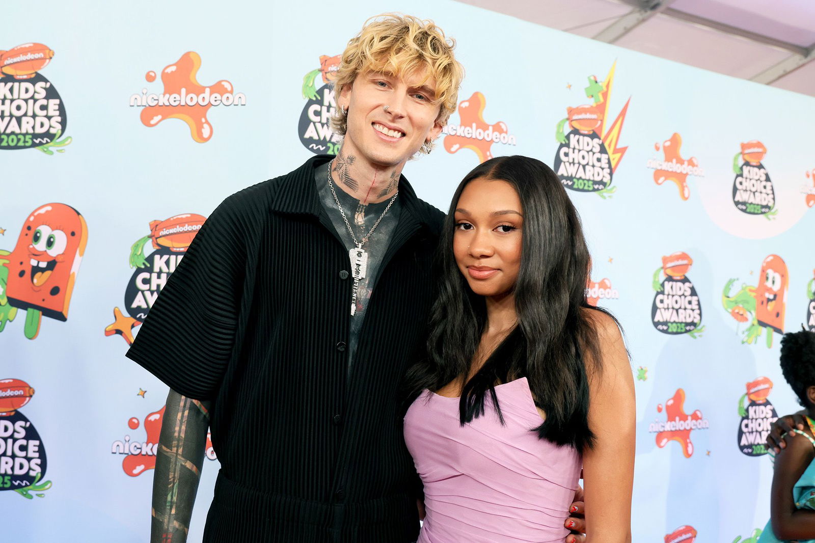 <i>Rodin Eckenroth/Getty Images via CNN Newsource</i><br/>MGK and Casie Baker attend the Nickelodeon Kids' Choice Awards 2025 at Barker Hangar on June 21