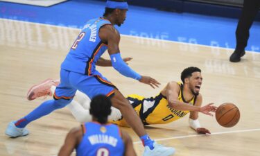 Indiana Pacers guard Tyrese Haliburton falls to the court with an injury during the first quarter of Game 7 of the NBA Finals.