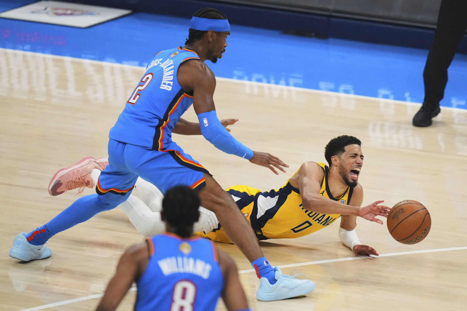 <i>Nate Billings/AP via CNN Newsource</i><br/>Indiana Pacers guard Tyrese Haliburton falls to the court with an injury during the first quarter of Game 7 of the NBA Finals.