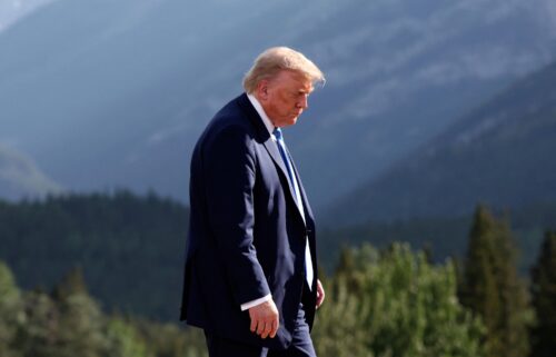 President Donald Trump leaves after a photo session during the G7 Summit