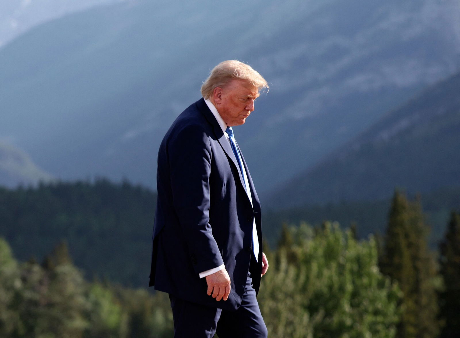<i>Suzanne Plunkett/Pool/AP via CNN Newsource</i><br/>President Donald Trump leaves after a photo session during the G7 Summit