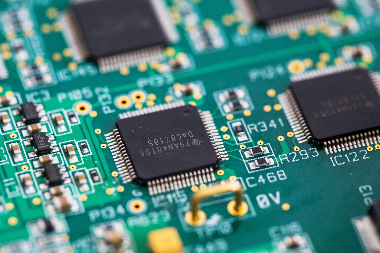 <i>Chris Ratcliffe/Bloomberg/Getty Images via CNN Newsource</i><br/>An integrated circuit microchip manufactured by Texas Instruments. The company pledged a major investment to expand US plants.