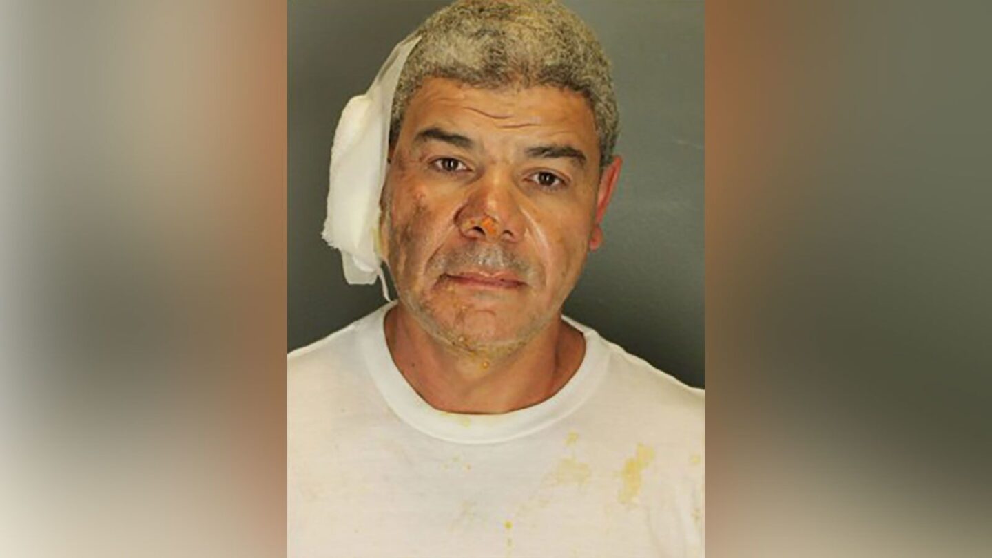 <i>OpusObscura/X/Reuters via CNN Newsource</i><br/>Law enforcement officers detain Soliman following the attack that injured multiple people on June 1.