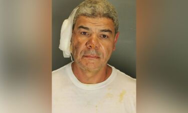 Law enforcement officers detain Soliman following the attack that injured multiple people on June 1.
