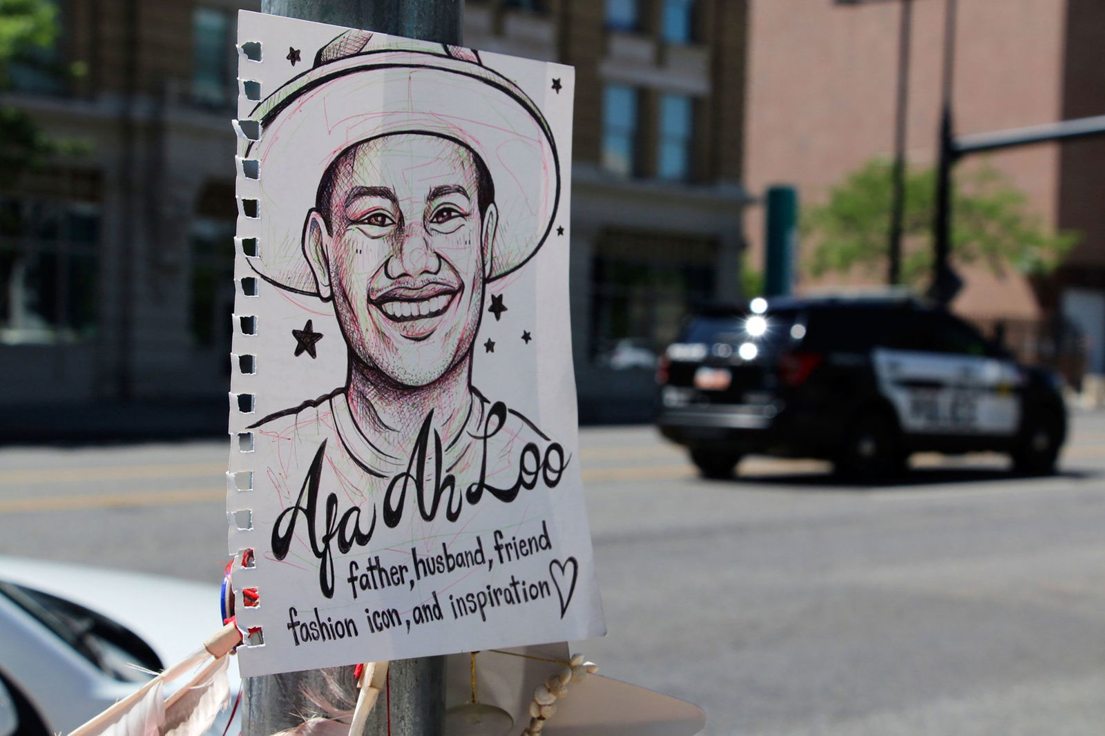 <i>Hannah Schoenbaum/AP via CNN Newsource</i><br/>A makeshift memorial for Arthur Folasa Ah Loo