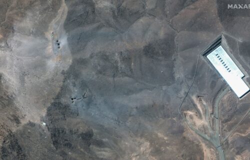 This satellite image provided by Maxar Technologies shows a closer view of craters and ash on a ridge at Fordow enrichment facility in Iran after US strikes
