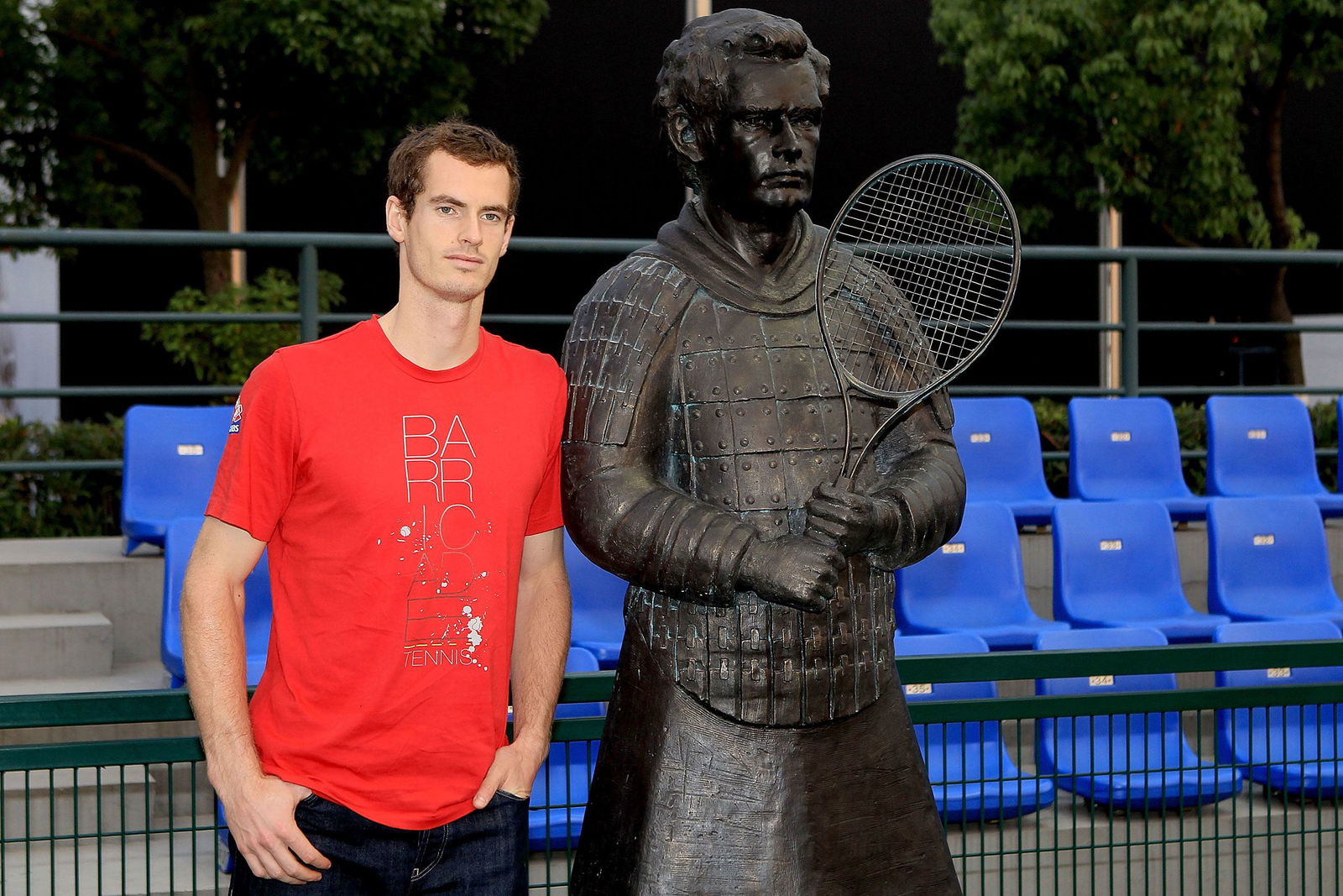 <i>Matthew Stockman/Getty Images via CNN Newsource</i><br/>Andy Murray poses next to his terracotta warrior.