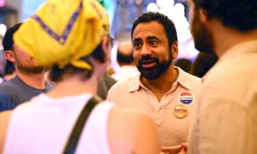 US Rep Nydia Velazquez of New York (L) and actress Cynthia Nixon (R) watch election returns during an election night gathering for New York mayoral candidate