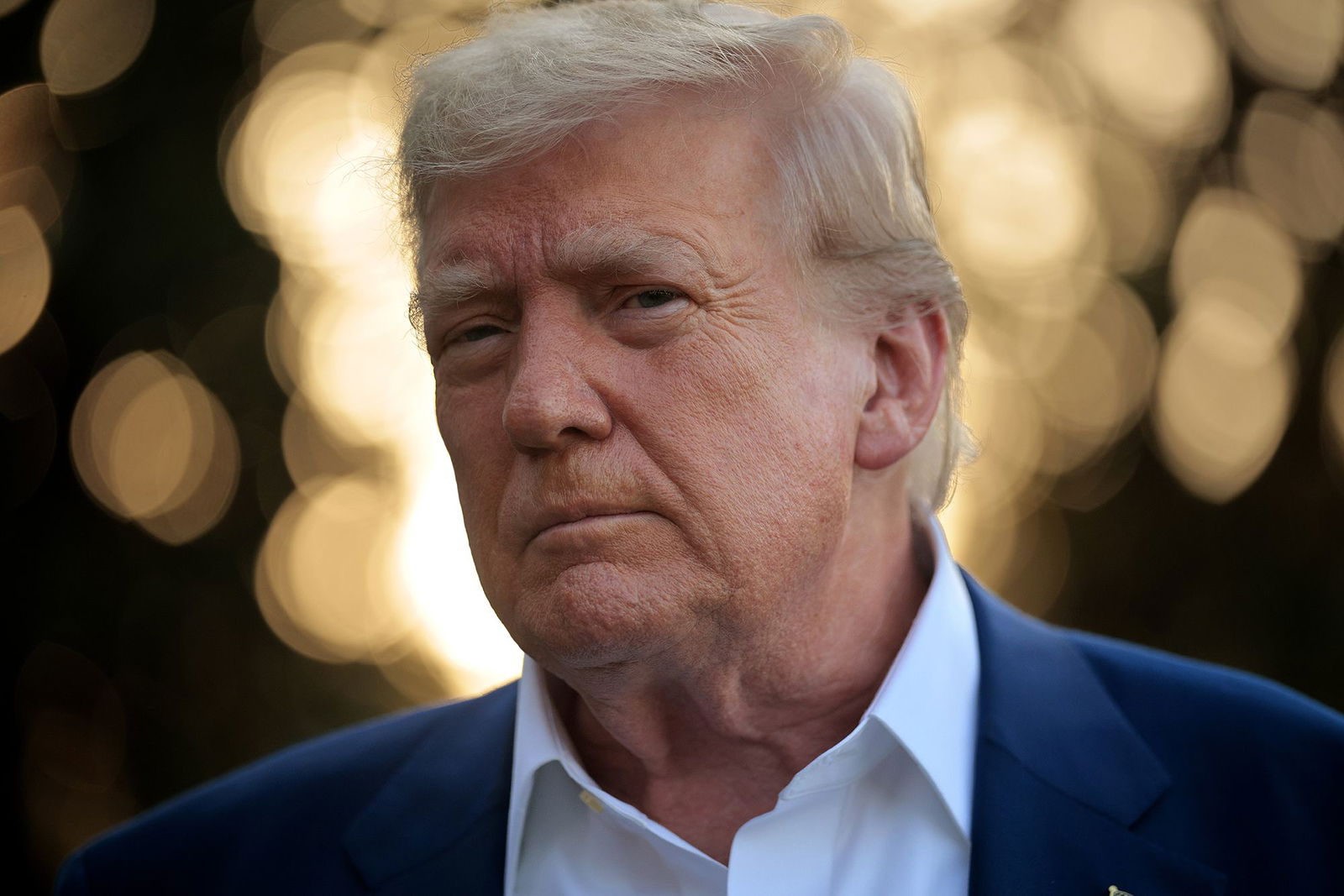 <i>Chip Somodevilla/Getty Images via CNN Newsource</i><br/>President Donald Trump speaks to reporters before boarding the Marine One presidential helicopter and departing the White House on June 24