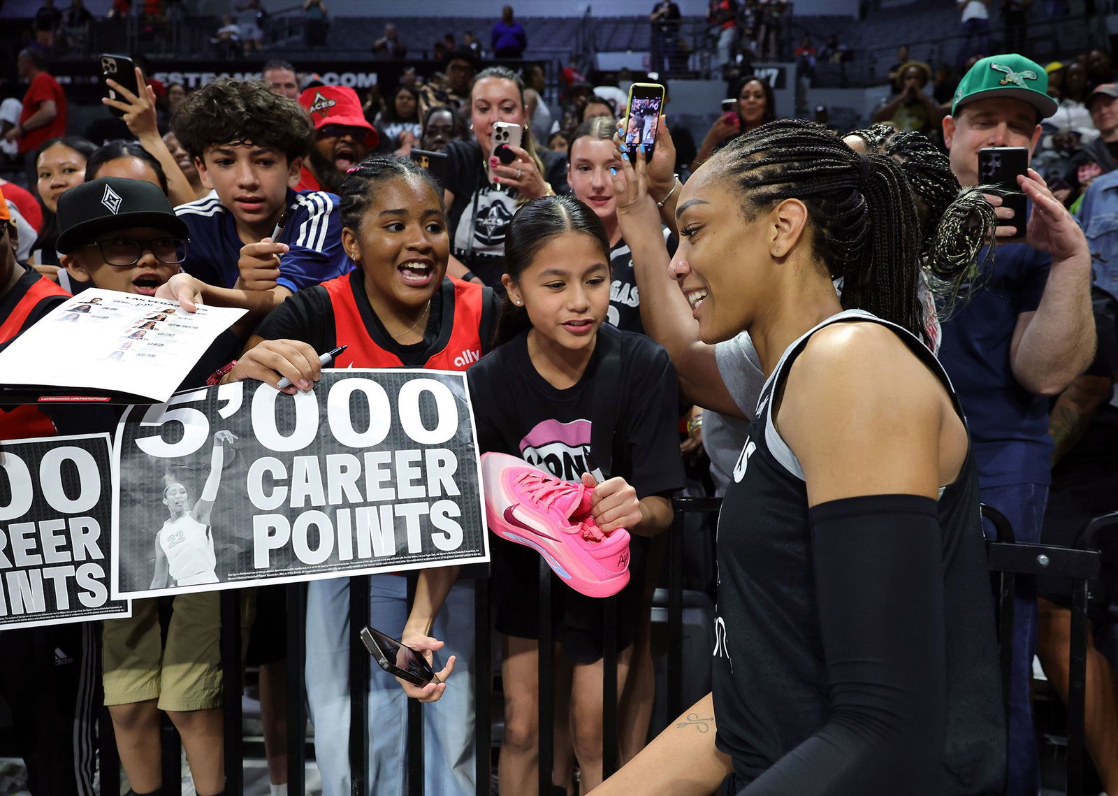 <i>Ethan Miller/Getty Images via CNN Newsource</i><br/>Wilson (left) had 22 points in the Aces' win over the Sun.