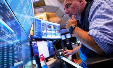 Trader Vincent Napolitano works on the floor of the New York Stock Exchange on June 25