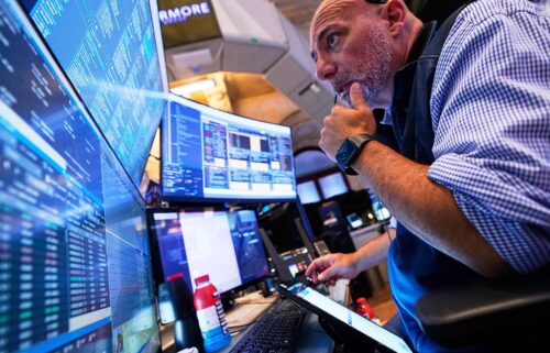 Trader Vincent Napolitano works on the floor of the New York Stock Exchange on June 25