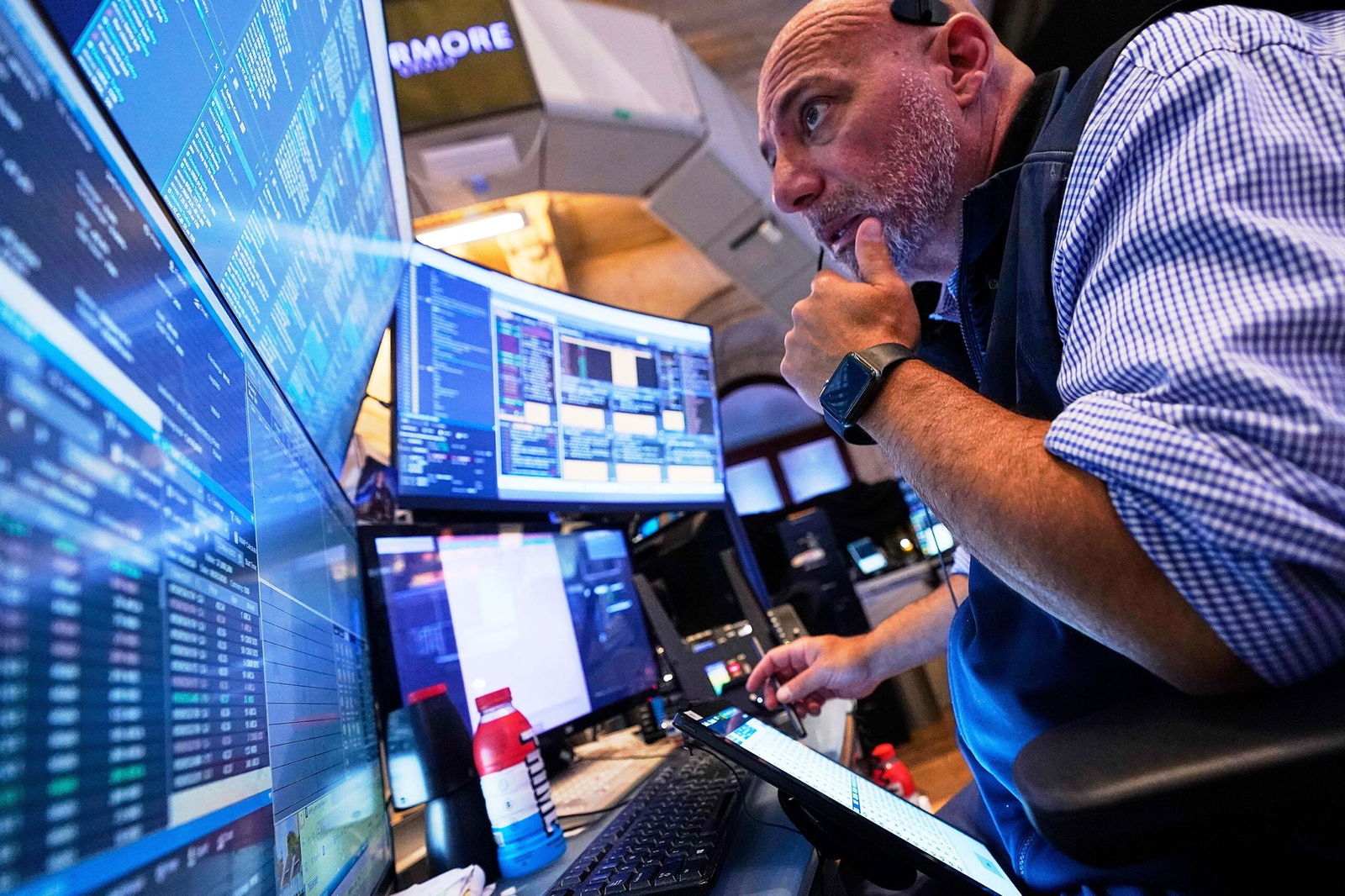 <i>Richard Drew/AP via CNN Newsource</i><br/>Trader Vincent Napolitano works on the floor of the New York Stock Exchange on June 25